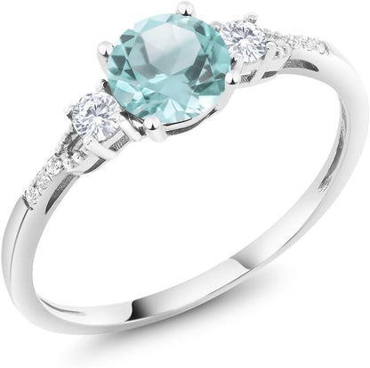 10K White Gold Sky Blue Topaz White Created Sapphire and White Diamond Accent 3-Stone Engagement Ring for Women (1.05 Cttw, round 6MM, Gemstone November Birthstone)