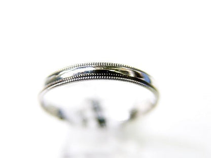 PLATINUM POLISHED BEADED OUTER PLATINUM WEDDING BAND