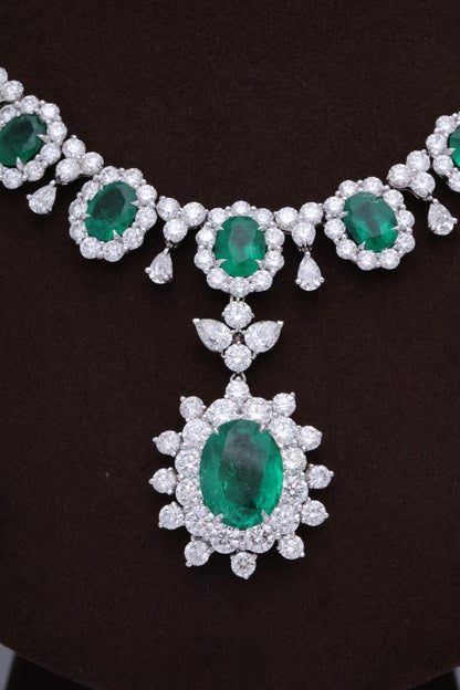 GRACEFUL EMERALD AND DIAMOND NECKLACE. 39.09 CARATS OF FINE GREEN EMERALD