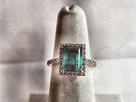 EMERALD GREEN RECTANGLE SHAPE 9.14X 6.92X 5.33MM DIAMOND