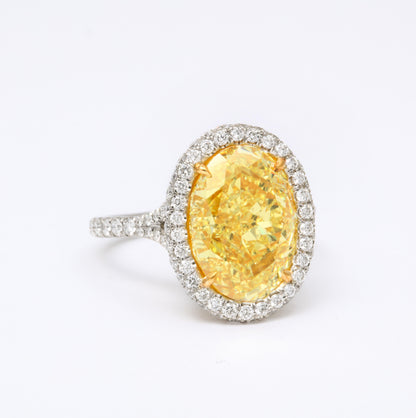 GIA Certified 5.05 Carat Oval Fancy Yellow Diamond Platinum Ring