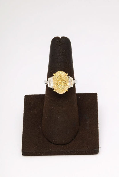 Stunning 6 Carat Oval Yellow Diamond Ring GIA Certified Platinum