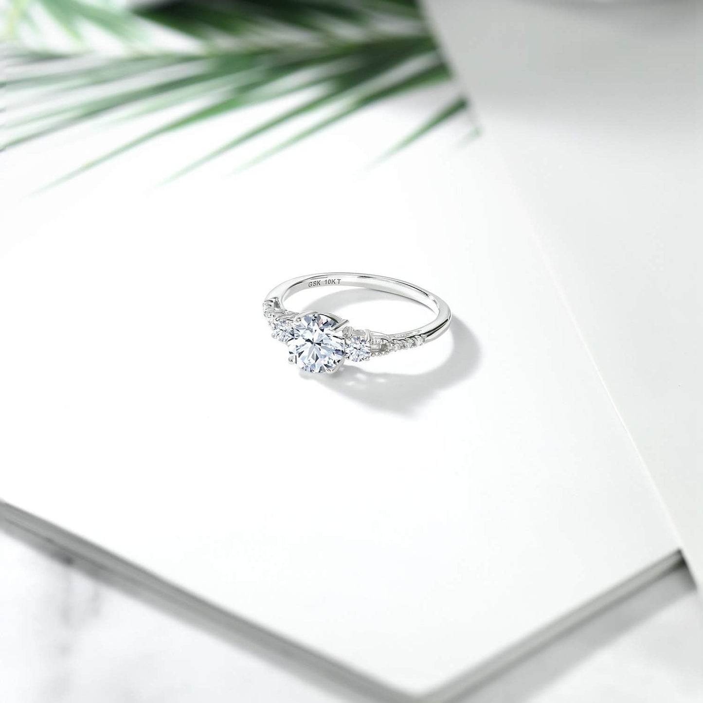 10K White Gold White Created Sapphire and White Diamond Accent 3-Stone Engagement Ring for Women (1.35 Cttw, round 6MM, Gemstone September Birthstone)