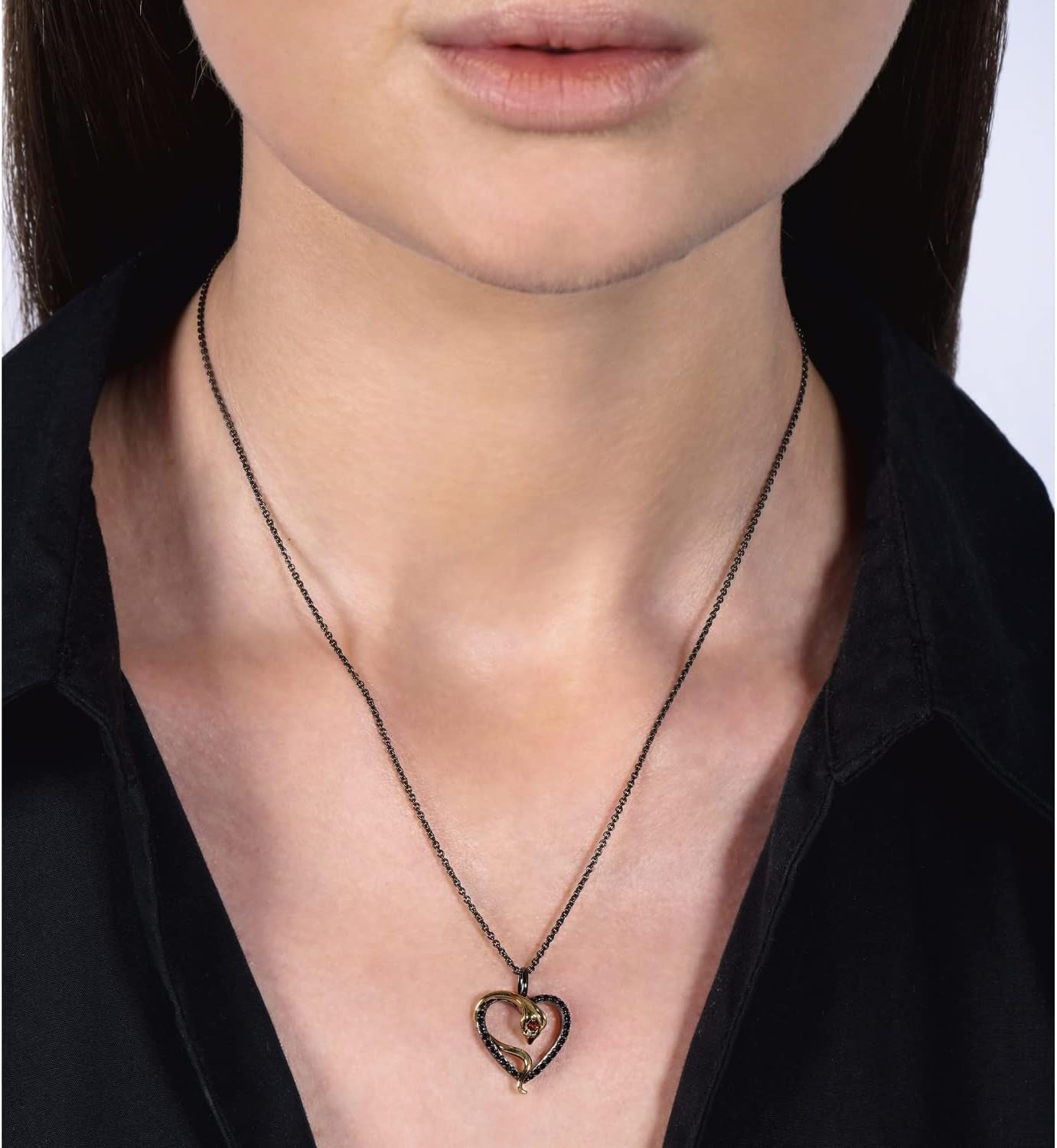 Enchanted Disney Fine Jewelry Black Rhodium over Sterling Silver and 10K Yellow Gold 1.75MM round Garnet and 1/5 Cttw Treated Black round Diamond Jafar Heart Pendant Necklace, 18" Cable Chain