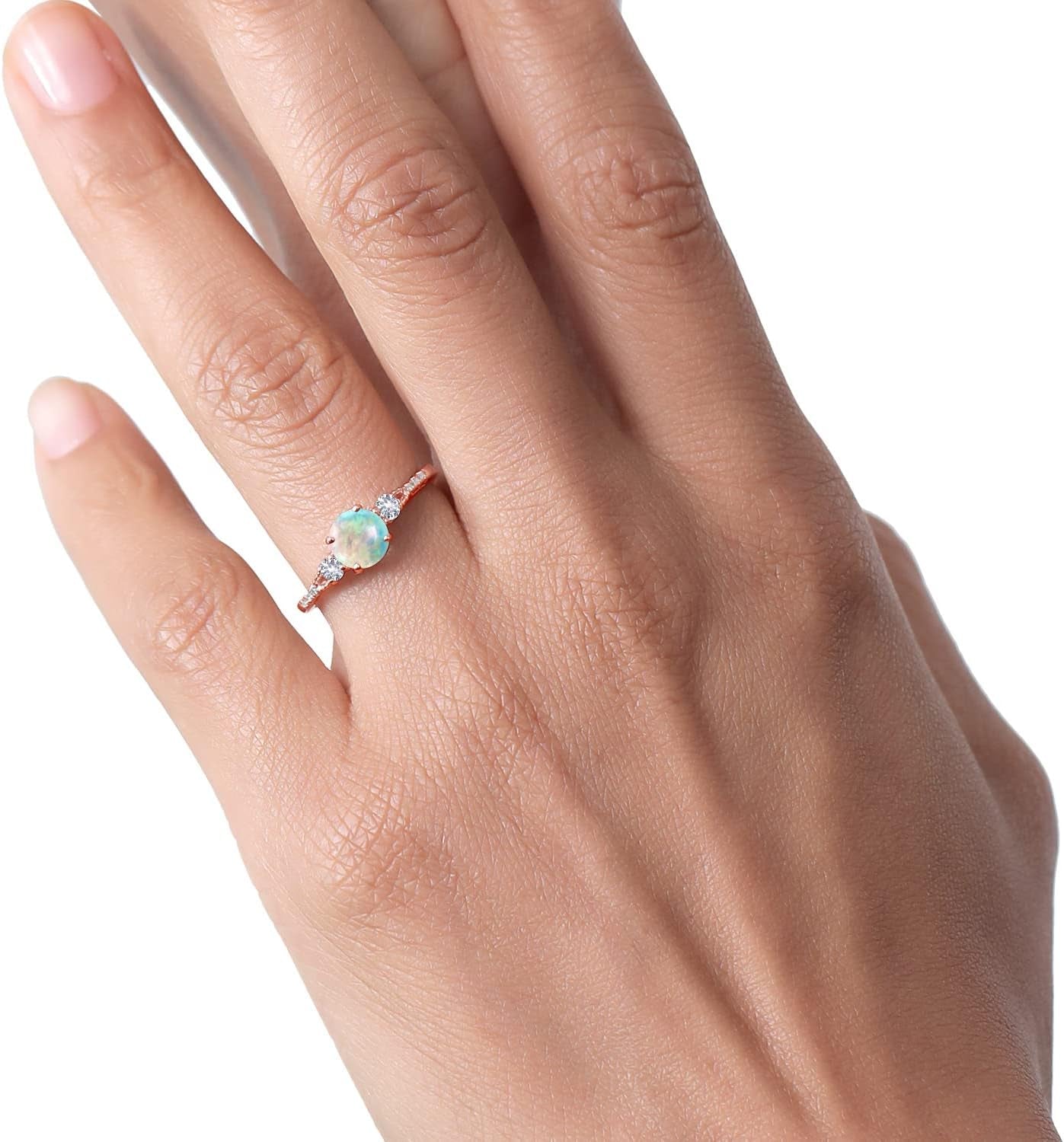 10K Rose Gold White Simulated Opal White Created Sapphire and Diamond Accent 3-Stone Engagement Ring for Women (0.89 Cttw, round Cabochon 6MM, Gemstone October Birthstone)
