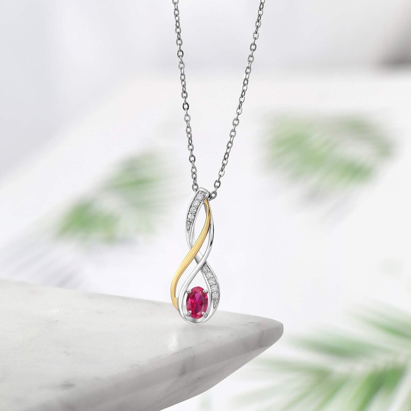 10K Yellow Gold and 925 Sterling Silver Red Created Ruby and White Lab Grown Diamond Pendant Necklace for Women (0.56 Cttw, Gemstone July Birthstone, Oval 6X4MM, with 18 Inch Silver Chain)